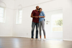 Happy couple in a new house